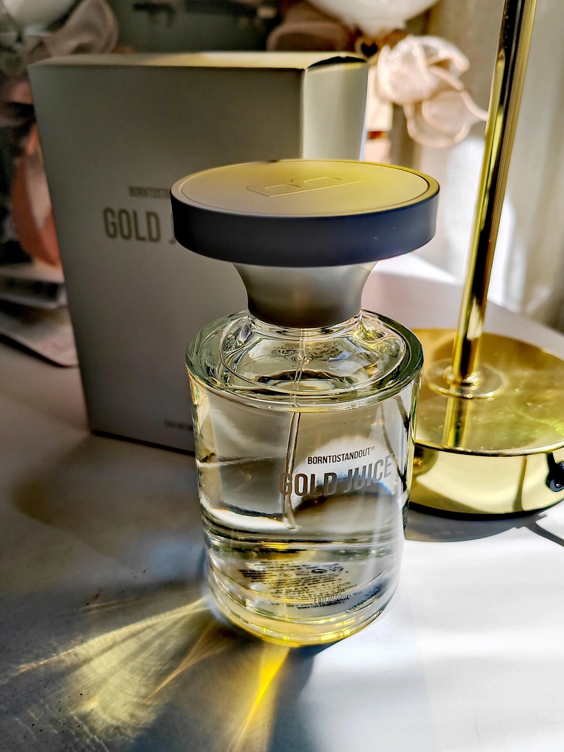 BORNTOSTANDOUT Gold Juice